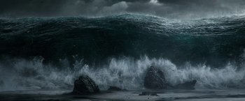 Movie still from “Exodus: Gods and Kings” (2014), directed by Ridley Scott – A large body of water with waves crashing on the shore; Extreme Wide shot, Low angle