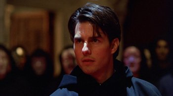 Movie still from “Eyes Wide Shut” (1999), directed by Stanley Kubrick – A man with a goatee looking to his left; Close Up shot, Low angle