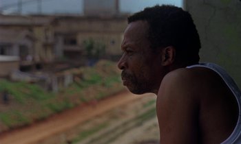 A person looking out of a window