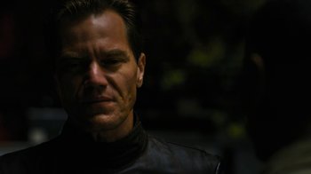 Movie still from “Fahrenheit 451” (2018), directed by Ramin Bahrani – A person wearing a leather jacket; Close Up shot, Low angle