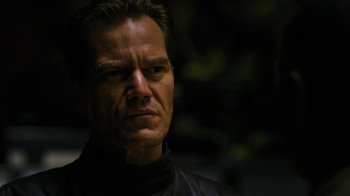 Movie still from “Fahrenheit 451” (2018), directed by Ramin Bahrani – A person wearing a black jacket; Close Up shot, Low angle