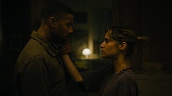 Movie still from “Fahrenheit 451” (2018), directed by Ramin Bahrani – A man and a woman touching their necks; Close Up shot, Over the shoulder angle
