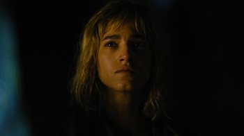 Movie still from “Fahrenheit 451” (2018), directed by Ramin Bahrani – A person's face in the dark; Close Up shot, High angle