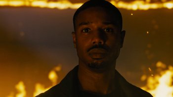 Movie still from “Fahrenheit 451” (2018), directed by Ramin Bahrani – A person wearing a black shirt; Close Up shot, Low angle