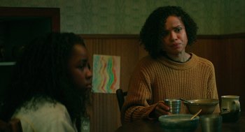 Movie still from “Fast Color” (2018), directed by Julia Hart – Two women sitting at a table with a cup of coffee; Medium shot, Over the shoulder angle
