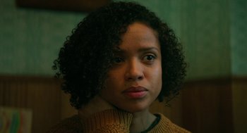 Movie still from “Fast Color” (2018), directed by Julia Hart – A person wearing a sweater; Close Up shot, Low angle