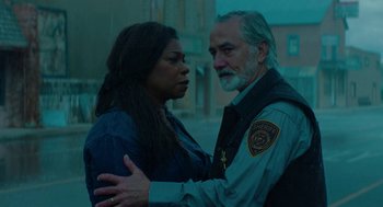 Movie still from “Fast Color” (2018), directed by Julia Hart – A man and a woman standing next to each other; Medium shot, Over the shoulder angle