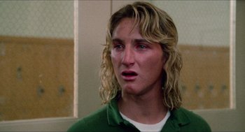 Movie still from “Fast Times at Ridgemont High” (1982), directed by Amy Heckerling – A person with long blonde hair; Close Up shot, Low angle