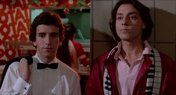 Movie still from “Fast Times at Ridgemont High” (1982), directed by Amy Heckerling – Two young men standing next to each other in a room; Close Up shot, Low angle