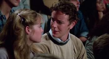 Movie still from “Fast Times at Ridgemont High” (1982), directed by Amy Heckerling – A man and a woman talking to each other; Close Up shot, Over the shoulder angle