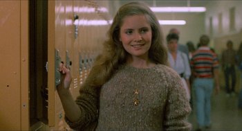 Movie still from “Fast Times at Ridgemont High” (1982), directed by Amy Heckerling – A young woman standing in front of lockers in a room; Close Up shot, Low angle
