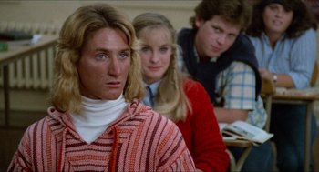 Movie still from “Fast Times at Ridgemont High” (1982), directed by Amy Heckerling – A group of young people sitting in a room; Close Up shot, Low angle
