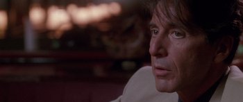 Movie still from “Glengarry Glen Ross” (1992), directed by James Foley – A man's face as he stares off into the distance; Close Up shot, Over the shoulder angle