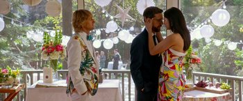 Movie still from “Father Figures” (2017), directed by Lawrence Sher – Two men and a woman standing next to each other; Medium shot, Over the shoulder angle