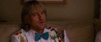 Movie still from “Father Figures” (2017), directed by Lawrence Sher – A person wearing a bow tie; Close Up shot, Over the shoulder angle