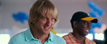 Movie still from “Father Figures” (2017), directed by Lawrence Sher – A person wearing a blue shirt; Close Up shot, Low angle