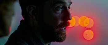 Movie still from “Father Figures” (2017), directed by Lawrence Sher – A person with a beard; Extreme Close Up shot, Over the shoulder angle