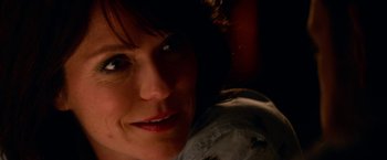 Movie still from “Father Figures” (2017), directed by Lawrence Sher – A woman's face in the dark; Close Up shot, Over the shoulder angle