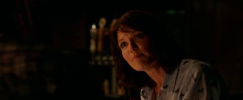 Movie still from “Father Figures” (2017), directed by Lawrence Sher – A person looking at the camera; Close Up shot, Over the shoulder angle