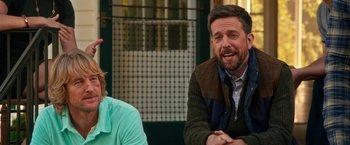 Movie still from “Father Figures” (2017), directed by Lawrence Sher – A man and a woman sitting next to each other; Close Up shot, Over the shoulder angle