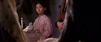Movie still from “Fiddler on the Roof” (1971), directed by Norman Jewison – A young girl in a plaid shirt looking at a man; Close Up shot, Over the shoulder angle