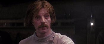 Movie still from “Fiddler on the Roof” (1971), directed by Norman Jewison – A person with a beard and mustache; Close Up shot, Low angle