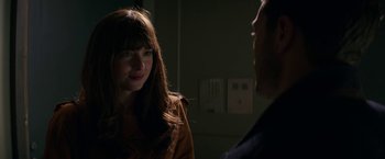 Movie still from “Fifty Shades Darker” (2017), directed by James Foley – A woman and a man are talking in a room; Close Up shot, Over the shoulder angle
