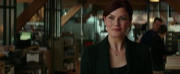 Movie still from “Fifty Shades Darker” (2017), directed by James Foley – A person wearing a suit; Close Up shot, Over the shoulder angle