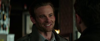 Movie still from “Fifty Shades Darker” (2017), directed by James Foley – A person wearing a jacket; Close Up shot, Over the shoulder angle