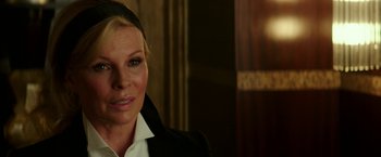 Movie still from “Fifty Shades Darker” (2017), directed by James Foley – A person wearing a suit and tie; Close Up shot, Over the shoulder angle