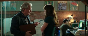 Movie still from “Fifty Shades Darker” (2017), directed by James Foley – A man and a woman talking to each other; Medium shot, Over the shoulder angle