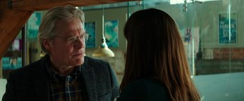 Movie still from “Fifty Shades Darker” (2017), directed by James Foley – An older man and a young woman talking in a restaurant; Close Up shot, Over the shoulder angle
