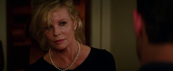 Movie still from “Fifty Shades Darker” (2017), directed by James Foley – A person wearing a necklace; Close Up shot, Over the shoulder angle