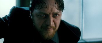 Movie still from “Filth” (2013), directed by Jon S. Baird – A person with wet hair; Close Up shot, Low angle