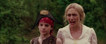 Movie still from “Finding Neverland” (2004), directed by Marc Forster – A woman and a young boy wearing pirate hats; Close Up shot, Over the shoulder angle