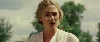 Movie still from “Finding Neverland” (2004), directed by Marc Forster – A person wearing a white shirt; Close Up shot, Low angle