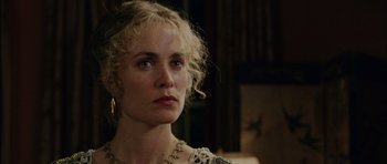 Movie still from “Finding Neverland” (2004), directed by Marc Forster – A person wearing a necklace; Close Up shot, Over the shoulder angle