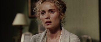 Movie still from “Finding Neverland” (2004), directed by Marc Forster – A person wearing a sweater; Close Up shot, Over the shoulder angle