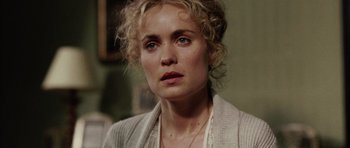 Movie still from “Finding Neverland” (2004), directed by Marc Forster – A person wearing a sweater; Close Up shot, Over the shoulder angle