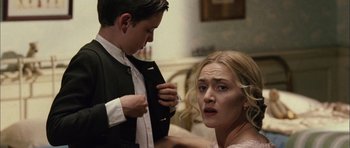 Movie still from “Finding Neverland” (2004), directed by Marc Forster – A man and a woman looking at each other; Medium shot, Over the shoulder angle