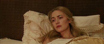 Movie still from “Finding Neverland” (2004), directed by Marc Forster – A woman laying in a bed with her head on a pillow; Close Up shot, Overhead angle