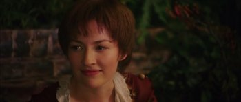 Movie still from “Finding Neverland” (2004), directed by Marc Forster – A person with short brown hair; Close Up shot, Over the shoulder angle