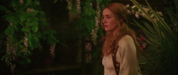 Movie still from “Finding Neverland” (2004), directed by Marc Forster – A woman standing in front of a tree; Close Up shot, Over the shoulder angle