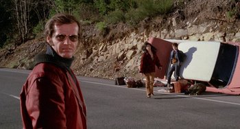 Movie still from “Five Easy Pieces” (1970), directed by Bob Rafelson – A man standing on the side of a road; Wide shot, Low angle
