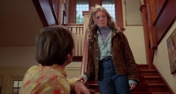 Movie still from “Five Easy Pieces” (1970), directed by Bob Rafelson – A young woman standing next to a young man; Medium shot, Low angle