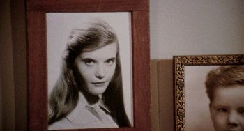 Movie still from “Five Easy Pieces” (1970), directed by Bob Rafelson – An old photo of a young woman is in a frame; Extreme Close Up shot, High angle