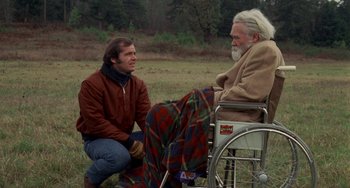 Movie still from “Five Easy Pieces” (1970), directed by Bob Rafelson – A man sitting next to an older man in a wheelchair; Wide shot, Over the shoulder angle