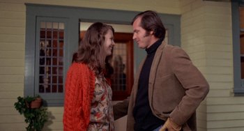 Movie still from “Five Easy Pieces” (1970), directed by Bob Rafelson – A man and a woman standing next to each other; Medium shot, High angle
