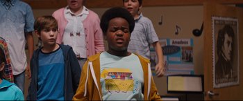 Movie still from “Good Boys” (2019), directed by Gene Stupnitsky – A group of young people singing in front of each other; Close Up shot, Low angle