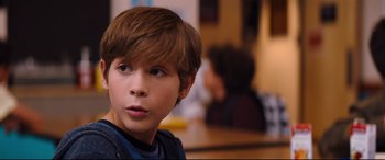 Movie still from “Good Boys” (2019), directed by Gene Stupnitsky – A young boy is looking into the distance; Close Up shot, Over the shoulder angle